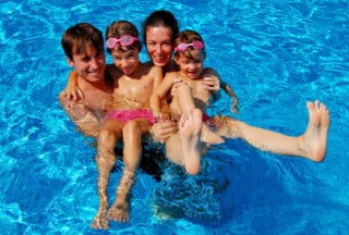 Family having fun in Valley Forge Inn swimming pool